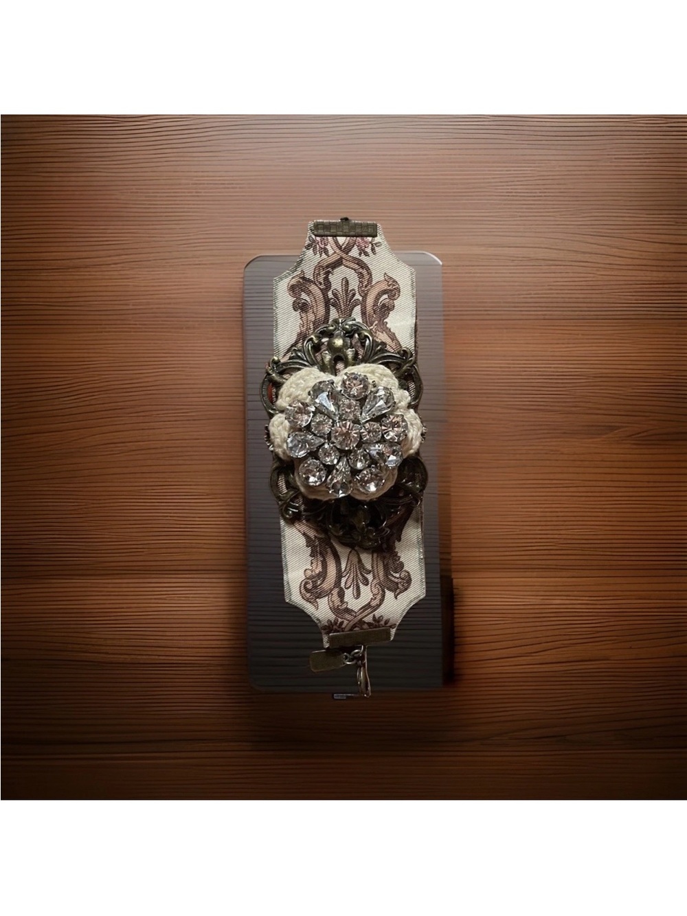 A Gilded Life Statement Bracelet with Crystal Floral Brooch